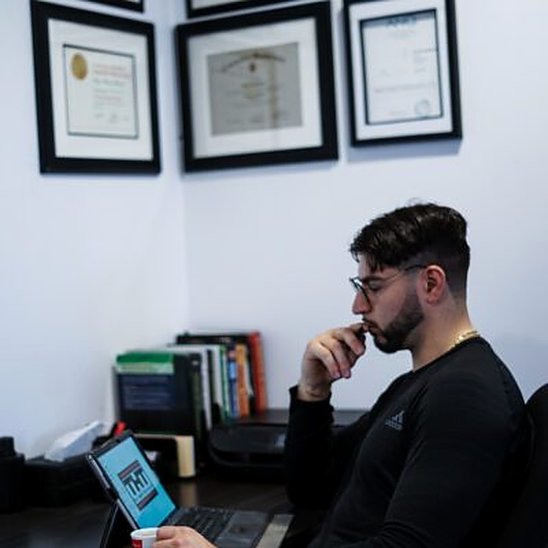 Coach K reviewing programs